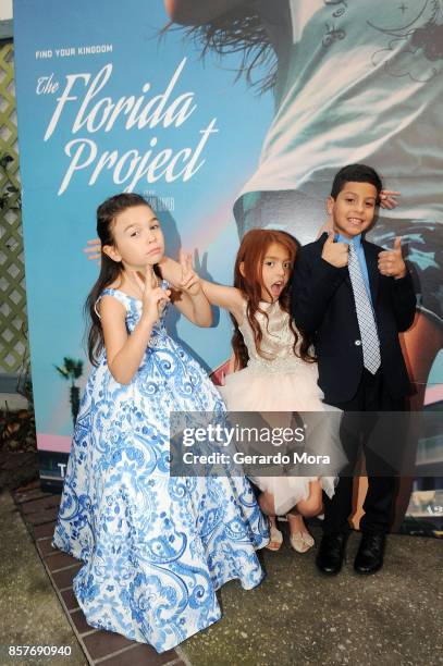 Cast members Brooklynn Prince, Valeria Cotto and Christopher Rivera pose during "THE FLORIDA PROJECT" Cast & Crew Orlando Premiere at The Enzian...