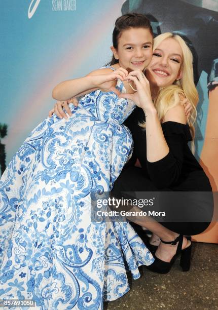 Actresses Brooklynn Prince and Bria Vinaite pose during "THE FLORIDA PROJECT" Cast & Crew Orlando Premiere at The Enzian Theater on October 4, 2017...