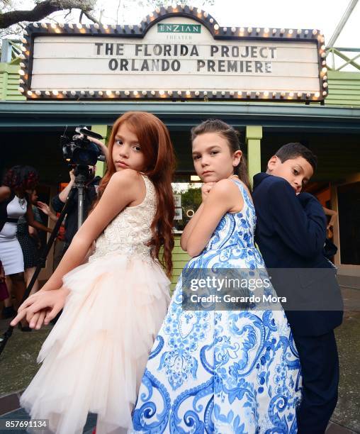 Cast members Valeria Cotto, Brooklynn Prince and Christopher Rivera pose during "THE FLORIDA PROJECT" Cast & Crew Orlando Premiere at The Enzian...