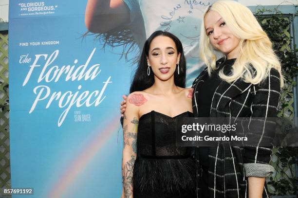 Actresses Mela Murder and Bria Vinaite pose during "THE FLORIDA PROJECT" Cast & Crew Orlando Premiere at The Enzian Theater on October 4, 2017 in...