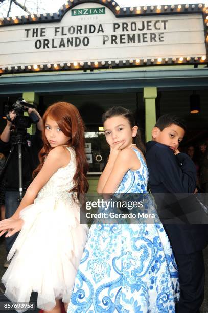 Cast members Valeria Cotto, Brooklynn Prince and Christopher Rivera pose during "THE FLORIDA PROJECT" Cast & Crew Orlando Premiere at The Enzian...