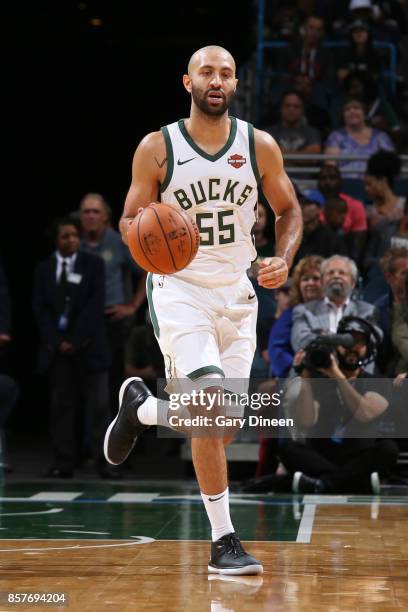 Milwaukee, WI Kendall Marshall of the Milwaukee Bucks handles the ball during a preseason game against the Indiana Pacers on October 4, 2017 at the...