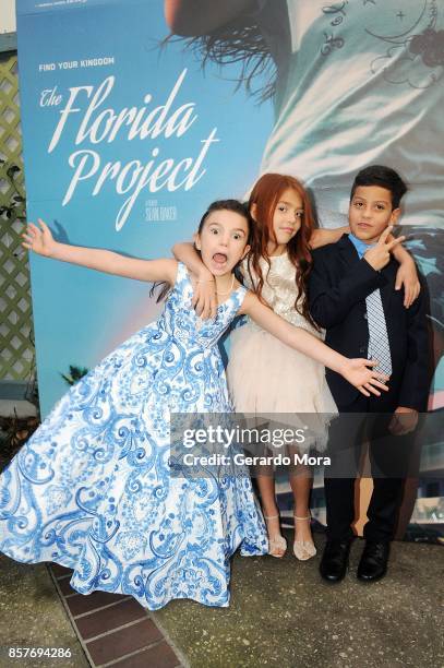 Cast members Brooklynn Prince, Valeria Cotto and Christopher Rivera pose during "THE FLORIDA PROJECT" Cast & Crew Orlando Premiere at The Enzian...