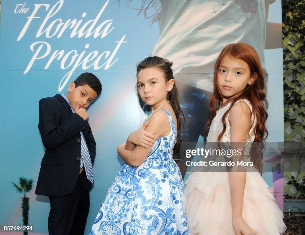 Cast members Christopher Rivera, Brooklynn Prince and Valeria Cotto pose during "THE FLORIDA PROJECT" Cast & Crew Orlando Premiere at The Enzian...