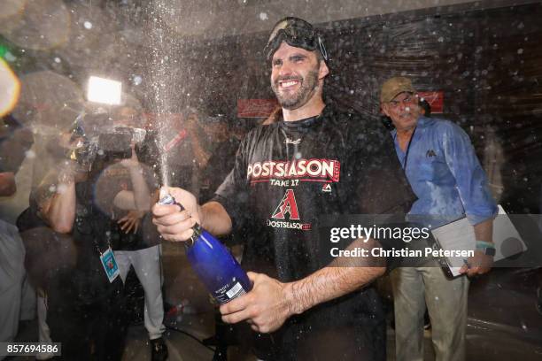 Martinez of the Arizona Diamondbacks celebrates in the locker room after defeating the Colorado Rockies 11-8 in the National League Wild Card game at...