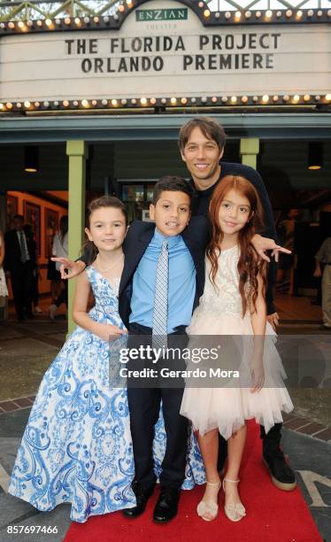 Director Sean Baker and cast members Brooklynn Prince, Christopher Rivera and Valeria Cotto pose during "THE FLORIDA PROJECT" Cast & Crew Orlando...