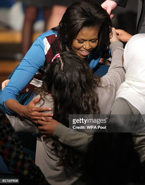 First Lady Michelle Obama meets students during a visit to the Elizabeth Garrett Anderson Secondary School on April 2, 2009 in Borough of Islington...