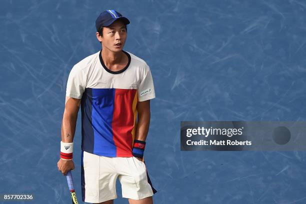 Yen-Hsun Lu of Chinese Taipei looks dejected in his match against Richard Gasquet of France during day four of the Rakuten Open at Ariake Coliseum on...