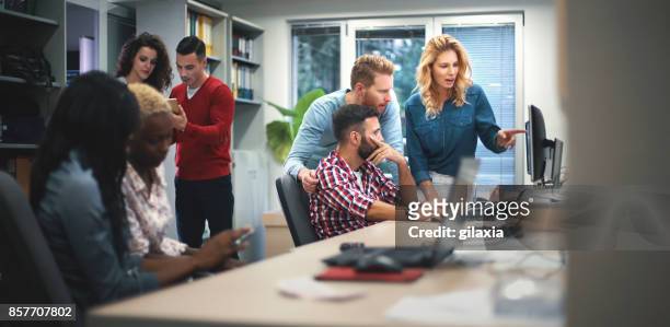 web designers at work. - staff meeting stock pictures, royalty-free photos & images