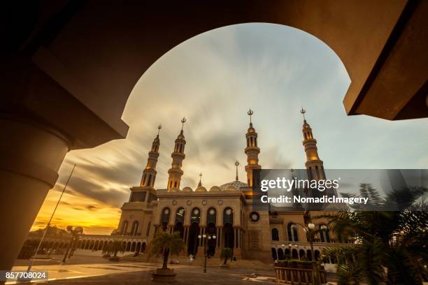 islamic center samarinda beautiful sunset view - samarinda islamic center mosque stock pictures, royalty-free photos & images