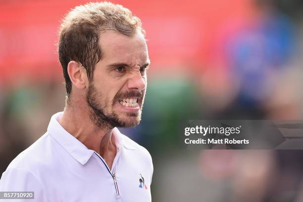 Richard Gasquet of France reacts in his match against Yen-Hsun Lu of Chinese Taipei during day four of the Rakuten Open at Ariake Coliseum on October...