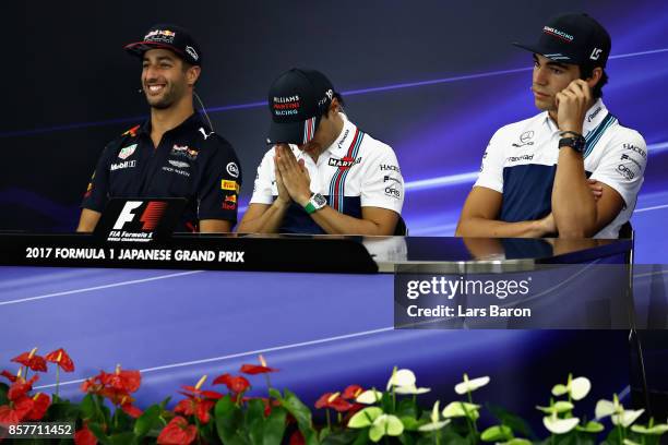 Daniel Ricciardo of Australia and Red Bull Racing, Felipe Massa of Brazil and Williams and Lance Stroll of Canada and Williams in the Drivers Press...