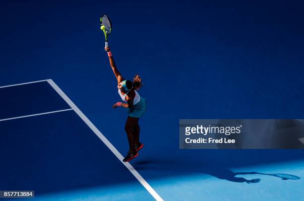 Sorana Cirstea of Romania serves against Karolina Pliskova of Czech Repubic during the Women's singles third round on day six of 2017 China Open at...