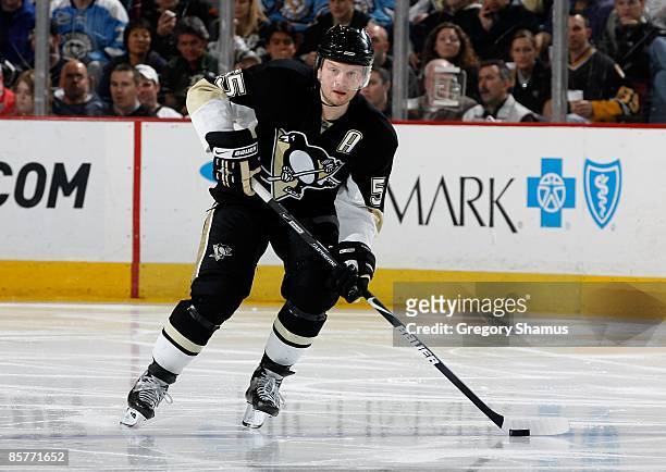 Sergei Gonchar of the Pittsburgh Penguins controls the puck against the New Jersey Devils on April 1, 2009 at Mellon Arena in Pittsburgh,...