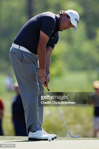 Phil Mickelson makes a putt on the 12th hole during the first round of the Shell Houston Open at Redstone Golf Club April 2, 2009 in Humble, Texas.