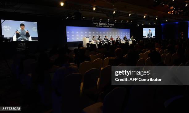 General view shows participants and visitors at the India Economic Summit in New Delhi on October 5, 2017. The World Economic Forums India Economic...