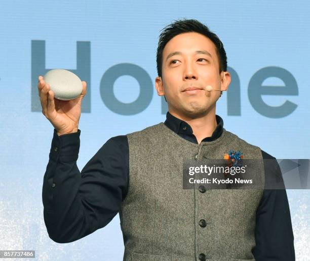 The Google Home Mini smart speaker, as shown during a press event in Tokyo on Oct. 5 will be sold in Japan from Oct. 6. It is the compact version of...