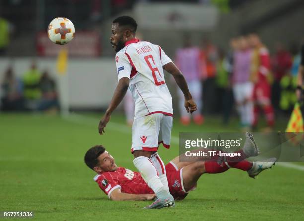 Guelor Kanga of Belgrad and Milos Jojic of Koeln battle for the ball during the UEFA Europa League group H match between 1. FC Koeln and Crvena...