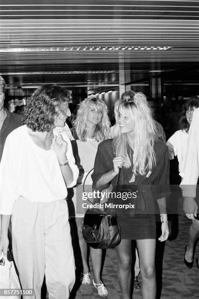 Mandy Smith at Gatwick Airport with her family and boyfriend Keith Daley, 14th August 1986.