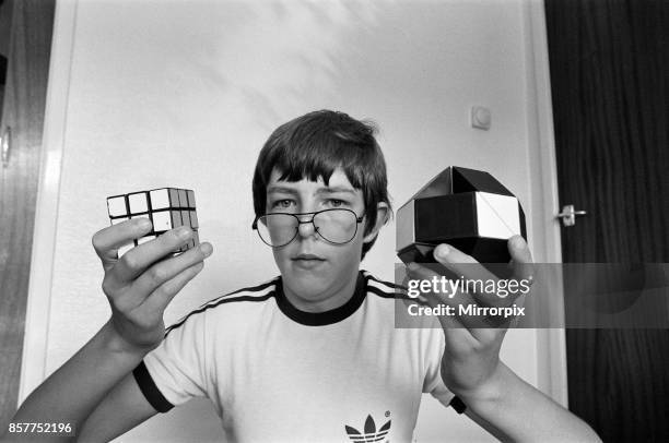 Year old Terence Wilson of Deepdale near Preston, with his Rubik cube and snake, 28th August 1981.