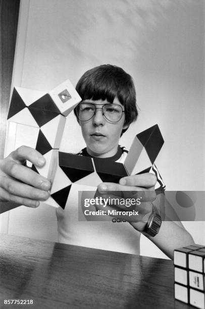 Year old Terence Wilson of Deepdale near Preston, with his Rubik cube and snake, 28th August 1981.