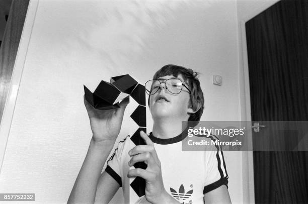 Year old Terence Wilson of Deepdale near Preston, with his Rubik snake, 28th August 1981.