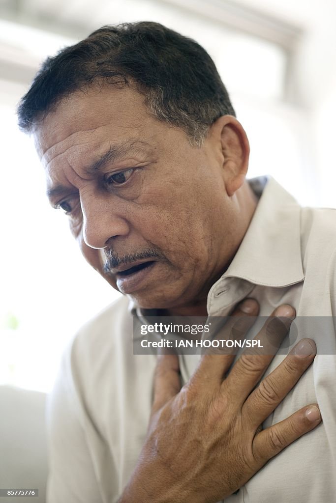 Man experiencing pain in chest