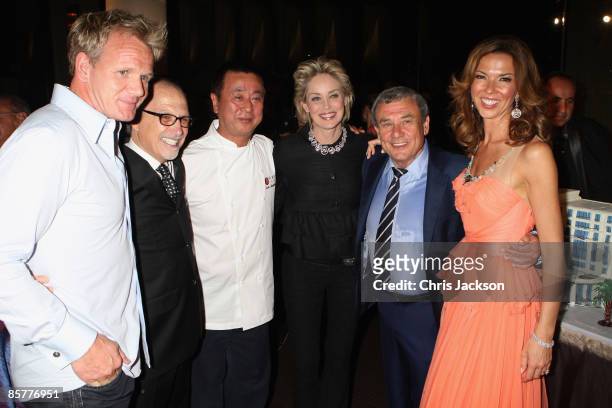 Gordon Ramsay, guest, Nobu Matsuhisa, actress Sharon Stone, Heather Kerzner and Sol Kerzner cut a cake at the Grand Opening of the new One&Only Cape...