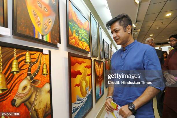 Niladri Paul during an opening of the group show, Creciente , at AIFACS Rafi Marg, on September 29, 2017 in New Delhi, India. The show brought...