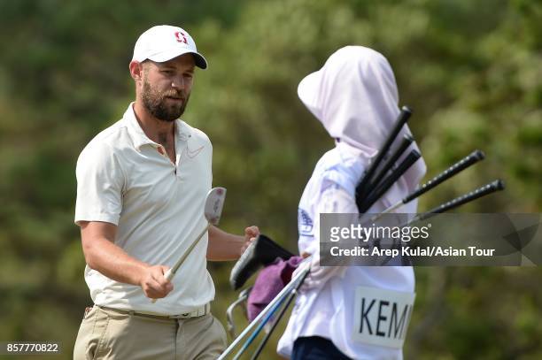 Dodge Kemmer of USA in action during round one for the Yeangder Tournament Players Championship at Linkou lnternational Golf and Country Club on...