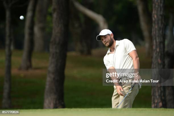 Dodge Kemmer of USA in action during round one for the Yeangder Tournament Players Championship at Linkou lnternational Golf and Country Club on...