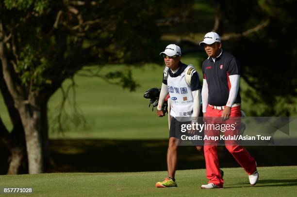 Lu Wei-chih of Taiwan in action during round one for the Yeangder Tournament Players Championship at Linkou lnternational Golf and Country Club on...