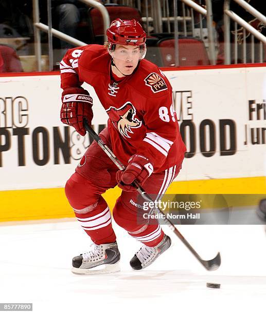 Mikkel Boedker of the Phoenix Coyotes looks to pass the puck up ice against the Dallas Stars on March 30, 2009 at Jobing.com Arena in Glendale,...