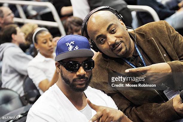 Music producer Polow Da Don and former NBA player Dennis Scott attend the Boston Celtics and Atlanta Hawks game at Philips Arena on March 27, 2009 in...