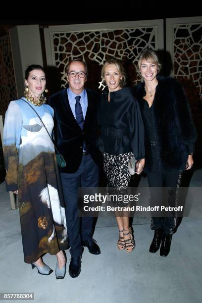 Star Dancer Marie-Agnes Gillot, CEO of Louis Roederer, Frederic Rouzaud, Estelle Lefebure and actress Pauline Lefevre attend the "Diner Surrealiste"...