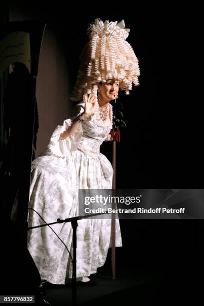 Armelle Lesniak performs during the "Diner Surrealiste" to celebrate the 241th birthday of "Maison Louis Roederer" on October 4, 2017 in Reims,...