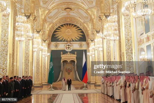 Russian President Vladimir Putin greets King Salman bin Abdulaziz Al Saud of Saudi Arabia at the Grand Kremlin Palaceon October 5, 2017 in Moscow,...