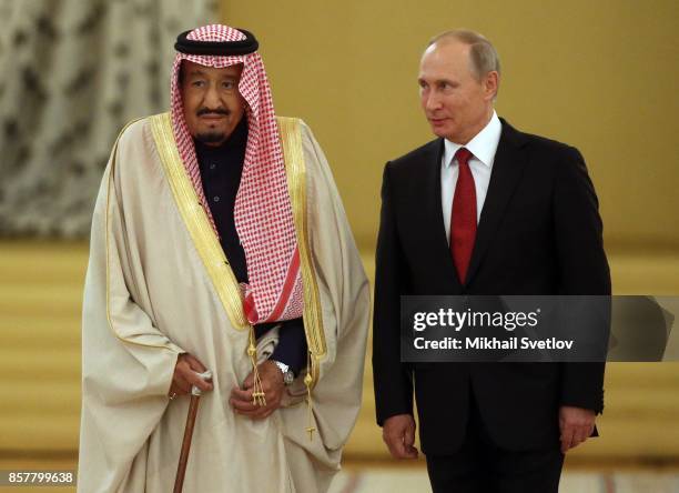 Russian President Vladimir Putin greets King Salman bin Abdulaziz Al Saud of Saudi Arabia at the Grand Kremlin Palaceon October 5, 2017 in Moscow,...