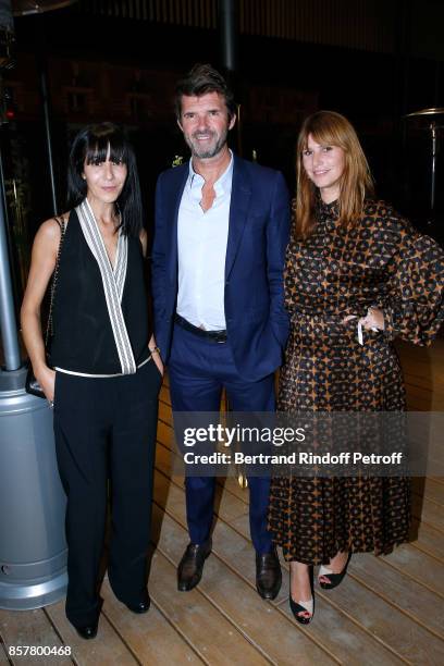 Stylist Bouchra Jarrar, CEO of Mazarine Group Paul-Emmanuel Reiffer and DJ Cecile Togni attend the "Diner Surrealiste" to celebrate the 241th...