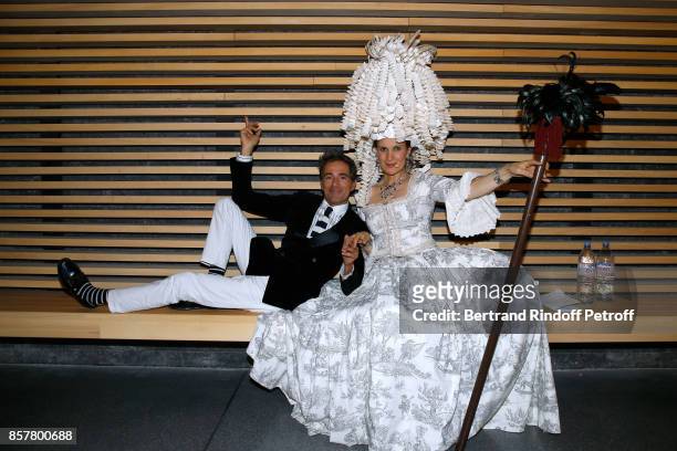 Vincent Darre and Armelle Lesniak attend the "Diner Surrealiste" to celebrate the 241th birthday of "Maison Louis Roederer" on October 4, 2017 in...