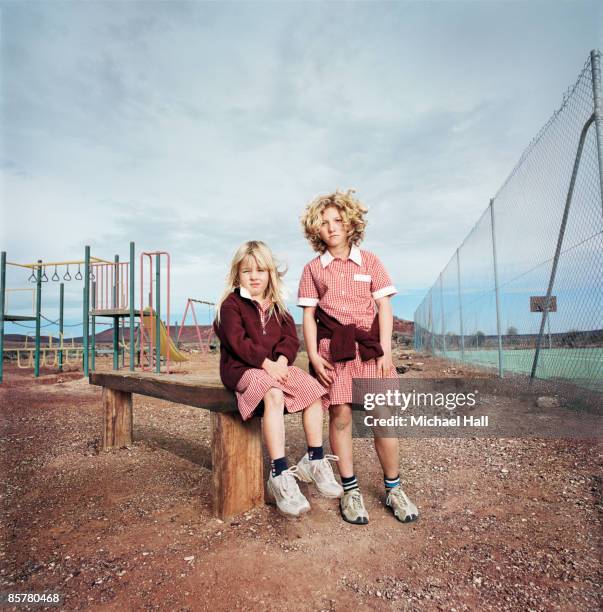 schoolchildren in playground - school pride stock pictures, royalty-free photos & images