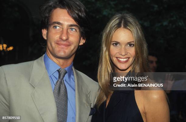 Top model Elle Macpherson with boyfriend Tim Jeffries at Haute Couture Fall Winter 1994-1995 Valentino show on July 20, 1994 in Paris, France.
