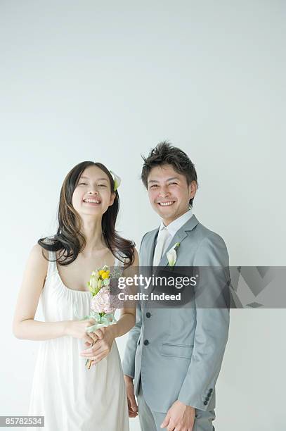 bride and groom smiling, portrait - asian bride stock pictures, royalty-free photos & images