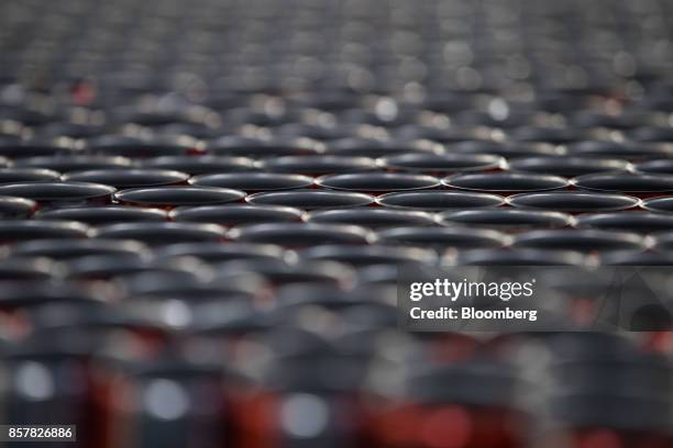 Empty soft-drink cans pass along a conveyor inside the Refresco Group NV beverage bottling factory in Maarheeze, Netherlands, on Thursday, Oct. 5....