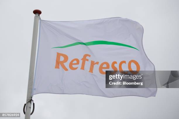 Refresco Group NV logo sits on a flag outside the Refresco soft-drink bottling factory in Maarheeze, Netherlands, on Thursday, Oct. 5. 2017. Dutch...