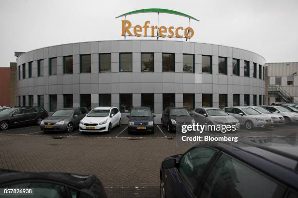 Refresco Group NV logo sits above the Refresco soft-drink bottling factory in Maarheeze, Netherlands, on Thursday, Oct. 5. 2017. Dutch soft-drink...