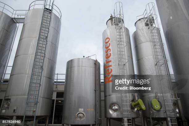 Storage silos stand outside the Refresco Group NV soft-drink bottling factory in Maarheeze, Netherlands, on Thursday, Oct. 5. 2017. Dutch soft-drink...