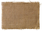 Patch of natural burlap fabric background.