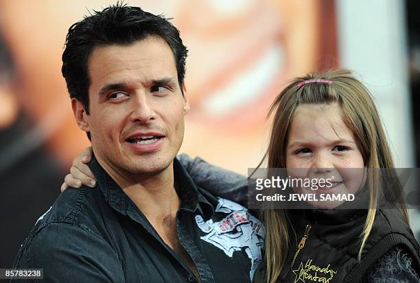 Actor Antonio Sabato Jr and daughter Mina Bree arrive at the world premiere of the "Hannah Montana: The Movie" at the El Capitan Theatre in...