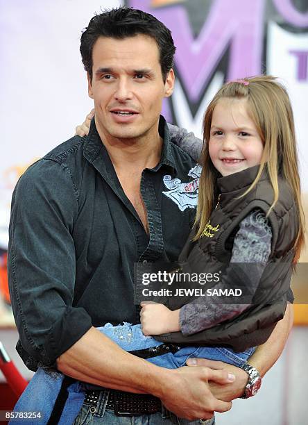 Actor Antonio Sabato Jr and daughter Mina Bree arrive at the world premiere of the "Hannah Montana: The Movie" at the El Capitan Theatre in...